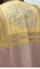 Bisht beige avec écriture